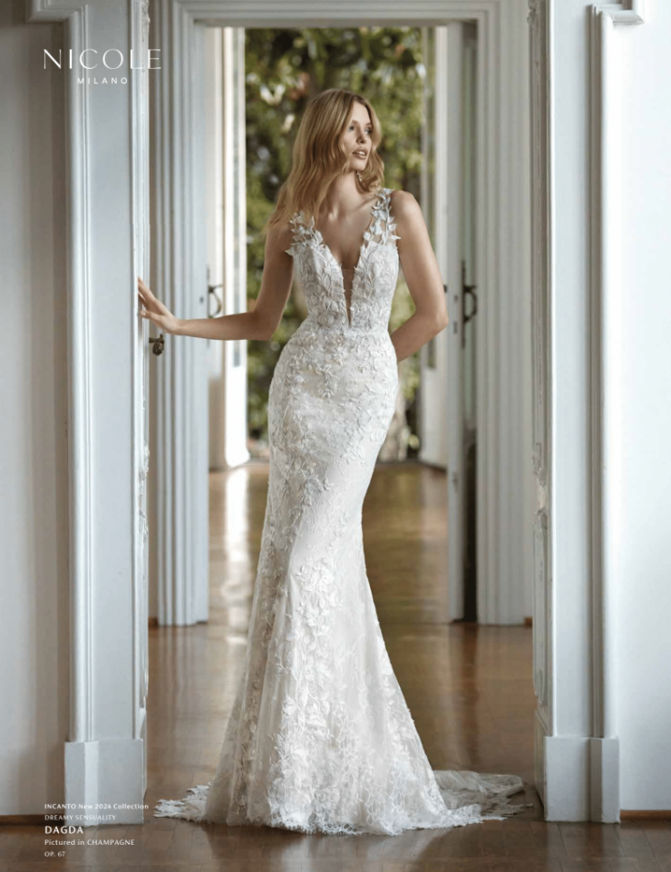 Nicole Milano Dagda Mermaid wedding dress in tulle Chantilly and lace with  Illusion Straps and back by Crystal Bridal